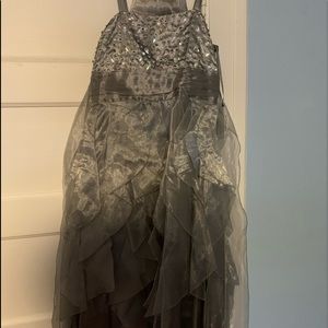 Sliver dress with diamonds.